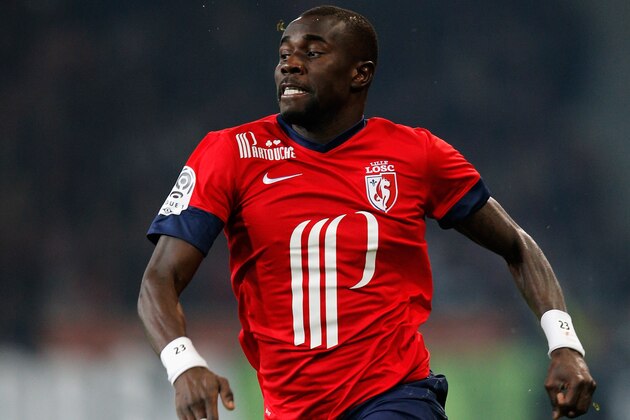 LILLE, FRANCE - DECEMBER 03:  Pape N'Diaye Souare of Lille in action during the Ligue 1 match between LOSC Lille and Olympique de Marseille held at Stade Pierre-Mauroy on December 3, 2013 in Lille, France.  (Photo by Dean Mouhtaropoulos/Getty Images)