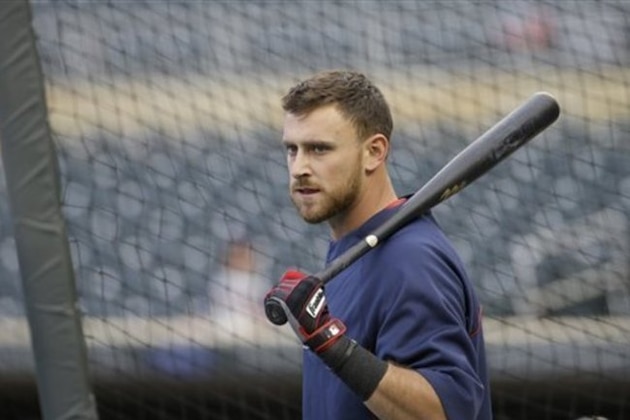 Boston Red Sox third baseman Will Middlebrooks waits to bat before a baseball game against the Minnesota Twins in Minneapolis, Wednesday, May 14, 2014.  (AP Photo/Ann Heisenfelt)