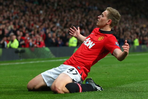 MANCHESTER, ENGLAND - MAY 06:  James Wilson of Manchester United celebrates scoring the second goal during the Barclays Premier League match between Manchester United and Hull City at Old Trafford on May 6, 2014 in Manchester, England.  (Photo by Alex Livesey/Getty Images)