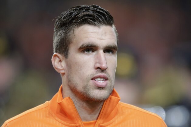 In this Nov. 19, 2013 image Netherlands' Kevin Strootman lines up prior to the  international friendly soccer match between Netherlands and Colombia at ArenA stadium in Amsterdam, Netherlands. In a severe blow to Dutch World Cup hopes, Netherlands coach Louis van Gaal said Monday March 10, 2014, that midfielder Kevin Strootman will miss the tournament after suffering a serious knee injury over the weekend playing for his club AS Roma. (AP Photo/Peter Dejong)