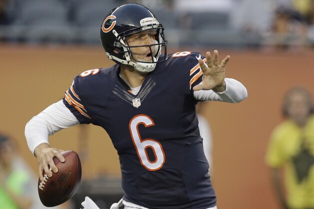 Chicago Bears quarterback Jay Cutler throws a pass in the first half of an NFL preseason football game against the Philadelphia Eagles on Friday, Aug. 8, 2014, in Chicago. (AP Photo/Nam Y. Huh)