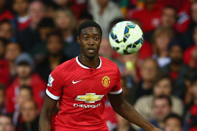 MANCHESTER, ENGLAND - AUGUST 12 Tyler Blackett of Manchester United in action during the Pre Season Friendly match between Manchester United and Valencia at Old Trafford on August 12, 2014 in Manchester, England.  (Photo by Clive Brunskill/Getty Images)