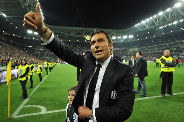 TURIN, ITALY - MAY 05:  Juventus head coach Antonio Conte celebrates after beating Atalanta BC 1-0 to win the Serie A Championships at the end of the Serie A match between Juventus and Atalanta BC at Juventus Arena on May 5, 2014 in Turin, Italy.  (Photo by Valerio Pennicino/Getty Images)