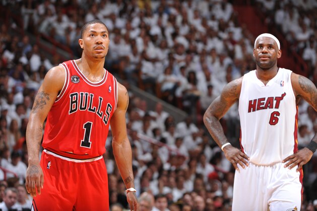 MIAMI, FL - MAY 24: Derrick Rose #1 of the Chicago Bulls and LeBron James #6 of the Miami Heat look on during Game Four of the Eastern Conference Finals in the 2011 NBA Playoffs on May 24, 2011 at the American Airlines Arena in Miami, Florida. NOTE TO USER: User expressly acknowledges and agrees that, by downloading and/or using this Photograph, user is consenting to the terms and conditions of the Getty Images License Agreement. Mandatory Copyright Notice: Copyright 2011 NBAE (Photo by Jesse D. Garrabrant/NBAE via Getty Images) MIAMI, FL - MAY 24: Derrick Rose #1 of the Chicago Bulls and LeBron James #6 of the Miami Heat look on during Game Four of the Eastern Conference Finals in the 2011 NBA Playoffs on May 24, 2011 at the American Airlines Arena in Miami, Florida. NOTE TO USER: User expressly acknowledges and agrees that, by downloading and/or using this Photograph, user is consenting to the terms and conditions of the Getty Images License Agreement. Mandatory Copyright Notice: Copyright 2011 NBAE (Photo by Jesse D. Garrabrant/NBAE via Getty Images)
