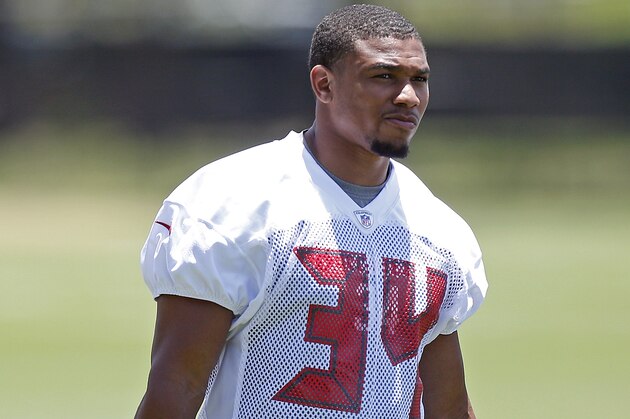 TAMPA, FL - MAY 16: Running Back Charles Sims #34 of the Tampa Bay Buccaneers works out during the first day of rookie minicamp on May 16, 2014 at One Buc Place in Tampa, Florida.  (Photo by Brian Blanco/Getty Images)