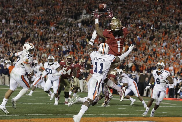Florida State's Kelvin Benjamin catches the game-winning touchdown pass during the second half of the NCAA BCS National Championship college football game against Auburn Monday, Jan. 6, 2014, in Pasadena, Calif. (AP Photo/Chris Carlson)