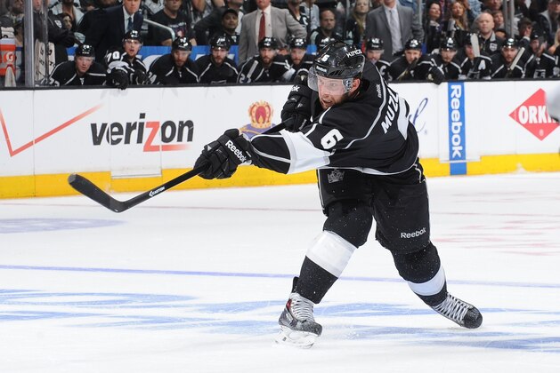 LOS ANGELES, CA - MAY 14:  Jake Muzzin #6 of the Los Angeles Kings takes a shot on goal against the Anaheim Ducks in Game Six of the Second Round of the 2014 Stanley Cup Playoffs at Staples Center on May 14, 2014 in Los Angeles, California. (Photo by Noah Graham/NHLI via Getty Images)
