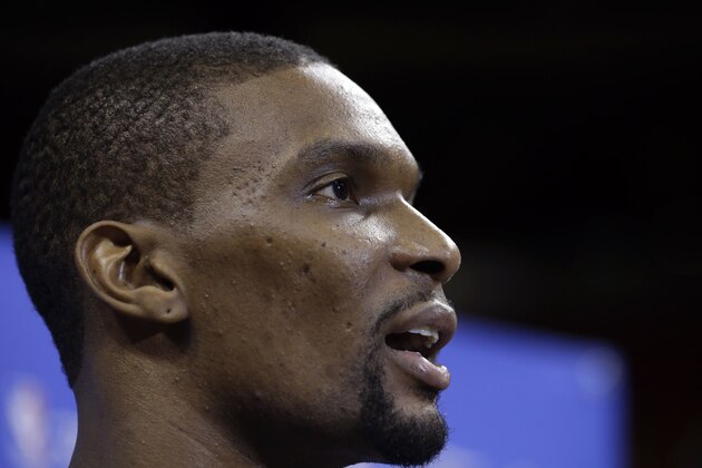 Miami Heat's Chris Bosh responds to questions during a media availability at the NBA Finals, Wednesday, June 11, 2014, in Miami. The San Antonio Spurs lead the Heat 2-1 in the best-of-seven games series. (AP Photo/Lynne Sladky) Miami Heat's Chris Bosh responds to questions during a media availability at the NBA Finals, Wednesday, June 11, 2014, in Miami. The San Antonio Spurs lead the Heat 2-1 in the best-of-seven games series. (AP Photo/Lynne Sladky)