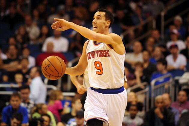 Feb 21, 2014; Orlando, FL, USA; New York Knicks point guard Pablo Prigioni (9) in the first half as the Knicks play the Magic at Amway Center. Mandatory Credit: David Manning-USA TODAY Sports