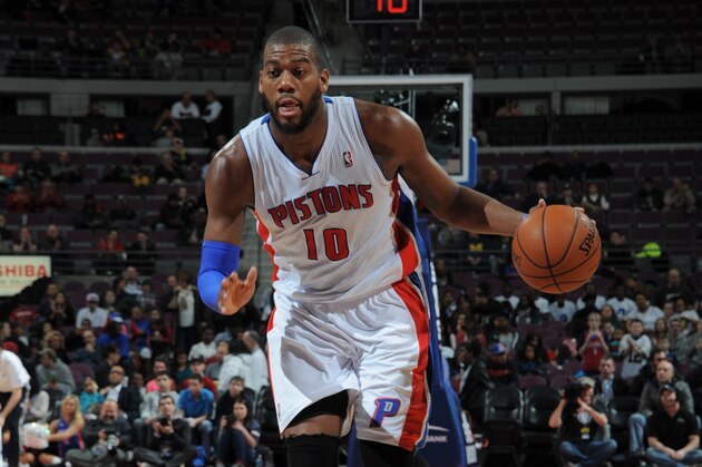 AUBURN HILLS, MI - FEBRUARY 18: Greg Monroe #10 of the Detroit Pistons dribbles the ball against the Charlotte Bobcats during the game on February 18, 2014 at The Palace of Auburn Hills in Auburn Hills, Michigan. NOTE TO USER: User expressly acknowledges and agrees that, by downloading and/or using this photograph, User is consenting to the terms and conditions of the Getty Images License Agreement.  Mandatory Copyright Notice: Copyright 2014 NBAE (Photo by Allen Einstein/NBAE via Getty Images)