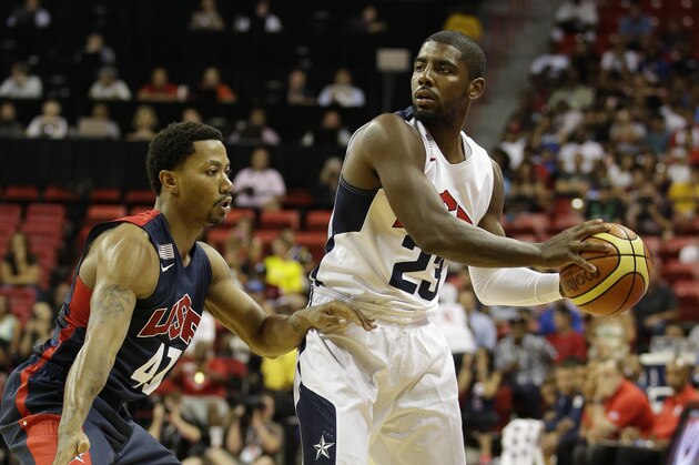 Chicago Bulls' Derrick Rose, left, guards Cleveland Cavaliers' Kyrie Irving during the USA Basketball Showcase game Friday, Aug. 1, 2014, in Las Vegas. (AP Photo/John Locher)