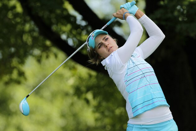 PITTSFORD, NY - AUGUST 14: Lexi Thompson hits her tee shot on the fourth hole during the first round of the Wegmans LPGA Championship at Monroe Golf Club on August 14, 2014 in Pittsford, New York. (Photo by Hunter Martin/Getty Images) PITTSFORD, NY - AUGUST 14: Lexi Thompson hits her tee shot on the fourth hole during the first round of the Wegmans LPGA Championship at Monroe Golf Club on August 14, 2014 in Pittsford, New York. (Photo by Hunter Martin/Getty Images)