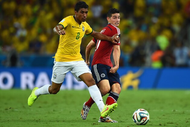 FORTALEZA, BRAZIL - JULY 04: Paulinho of Brazil challenges James Rodriguez of Colombia during the 2014 FIFA World Cup Brazil Quarter Final match between Brazil and Colombia at Castelao on July 4, 2014 in Fortaleza, Brazil. (Photo by Laurence Griffiths/Getty Images) FORTALEZA, BRAZIL - JULY 04: Paulinho of Brazil challenges James Rodriguez of Colombia during the 2014 FIFA World Cup Brazil Quarter Final match between Brazil and Colombia at Castelao on July 4, 2014 in Fortaleza, Brazil. (Photo by Laurence Griffiths/Getty Images)
