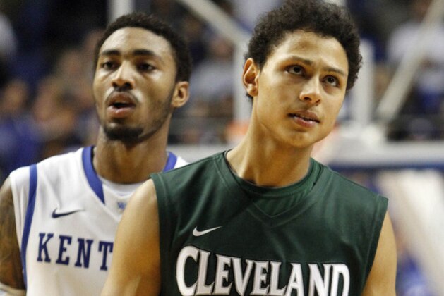 Cleveland State's Bryn Forbes (2) looks dejectedly at the score board late in the second half of an NCAA college basketball game against Kentucky, Monday, Nov. 25, 2013, in Lexington, Ky. Kentucky won 68-61. (AP Photo/James Crisp)