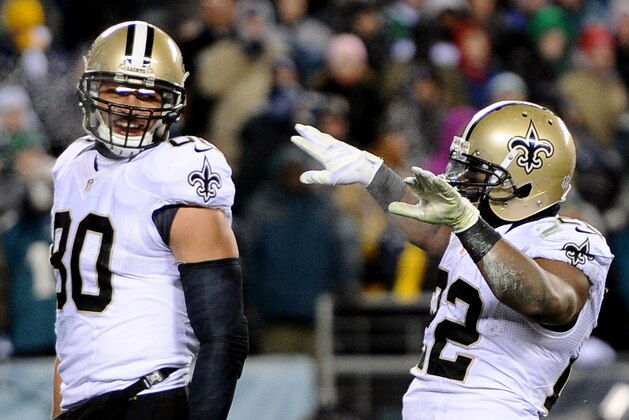 PHILADELPHIA, PA - JANUARY 04:  Mark Ingram #22 of the New Orleans Saints celebrates with teammate  Jimmy Graham #80 after running for a 4 yard touchdown in the third quarter against the Philadelphia Eagles during their NFC Wild Card Playoff game at Lincoln Financial Field on January 4, 2014 in Philadelphia, Pennsylvania.  (Photo by Maddie Meyer/Getty Images)