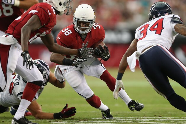GLENDALE, AZ - AUGUST 09:  Running back Andre Ellington #38 of the Arizona Cardinals rushes the football against the Houston Texans during the preseason NFL game at the University of Phoenix Stadium on August 9, 2014 in Glendale, Arizona. The Cardinals defeated the Texans 32-0.  (Photo by Christian Petersen/Getty Images)
