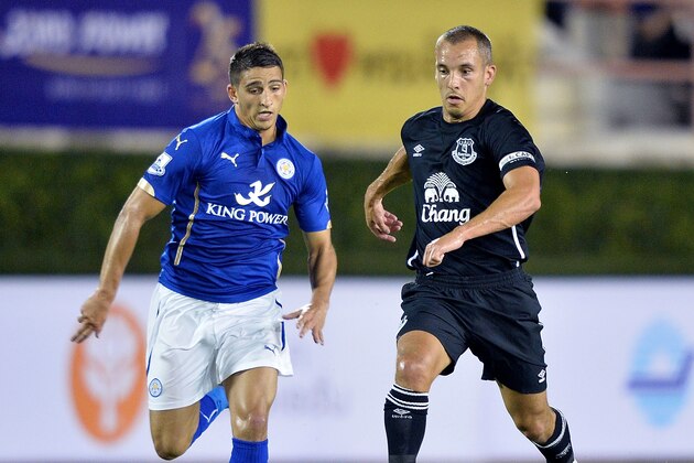 BANGKOK, THAILAND - JULY 27: Anthony Knockaert of Leicester City competes for the ball with Leon Osman of Everton during the pre-season match between Leicester City and Everton at Supachalasai Stadium on July 27, 2014 in Bangkok, Thailand.  (Photo by Thananuwat Srirasant/Getty Images)