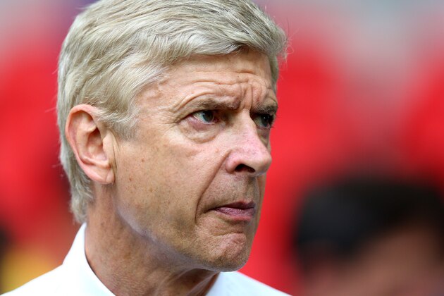 LONDON, ENGLAND - AUGUST 10: Arsene Wenger, manager of Arsenal looks on during the FA Community Shield match between Manchester City and Arsenal at Wembley Stadium on August 10, 2014 in London, England.  (Photo by Clive Mason/Getty Images)