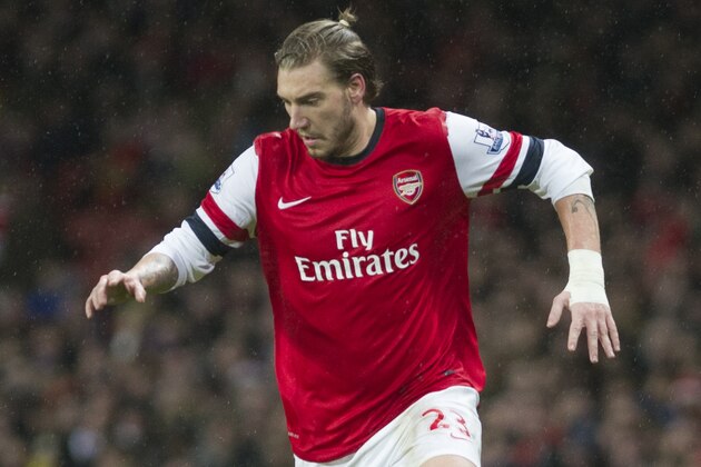 Arsenal's Nicklas Bendtner, controls the ball against Cardiff City, during their English Premier League match, at Emirates Stadium, in London, Wednesday, Jan. 1, 2014. (AP Photo/Bogdan Maran)