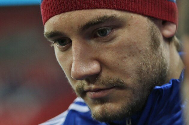 Denmark's Nicklas Bendtner talks to members of the media during a training session at Wembley Stadium in London, Monday, March 3, 2014. Denmark will play against England in an international friendly on Wednesday March 5. (AP Photo/Lefteris Pitarakis)