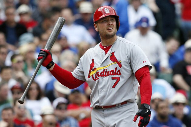 St. Louis Cardinals' Matt Holliday reacts to striking out during the sixth inning of a baseball game against the Chicago Cubs on Saturday, May 3, 2014, in Chicago. The Cubs won 3-0. (AP Photo/Andrew A. Nelles)
