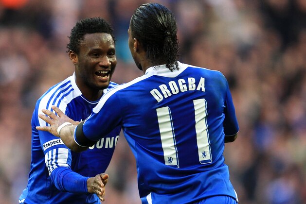 LONDON, ENGLAND - APRIL 15:  Didier Drogba of Chelsea (11) celebrates with John Obi Mikel as he scores their first goal during the FA Cup with Budweiser Semi Final match between Tottenham Hotspur and Chelsea at Wembley Stadium on April 15, 2012 in London, England.  (Photo by Michael Steele/Getty Images)
