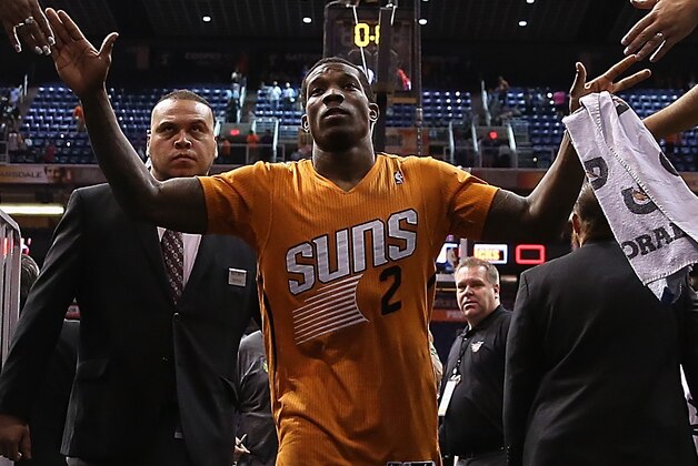 PHOENIX, AZ - MARCH 28:  Eric Bledsoe #2 of the Phoenix Suns high fives fans as he walks off the court following the NBA game against the New York Knicks at US Airways Center on March 28, 2014 in Phoenix, Arizona.  The Suns defeated the Knicks 112-88.  NOTE TO USER: User expressly acknowledges and agrees that, by downloading and or using this photograph, User is consenting to the terms and conditions of the Getty Images License Agreement.  (Photo by Christian Petersen/Getty Images)