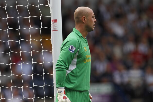 Liverpool's goalkeeper Pepe Reina plays against West Bromwich Albion during their English Premier League soccer match at the Hawthorns, West Bromwich, England, Saturday, Aug. 18, 2012. (AP Photo/Sang Tan)