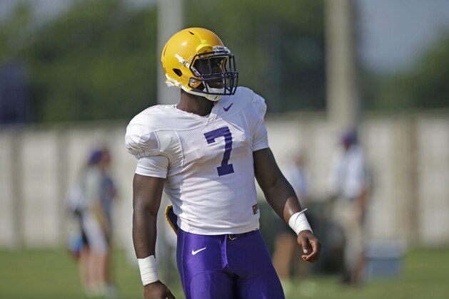LSU freshman running back Leonard Fournette (7) runs through drills during their NCAA college football practice in Baton Rouge, La., Wednesday, Aug. 6, 2014. (AP Photo/Gerald Herbert)