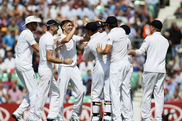England's Chris Woakes, centre, celebrates with teammates after taking the wicket of India's Murali Vijay during the first day of the fifth test cricket match at Oval cricket ground in London, Friday, Aug. 15, 2014. (AP Photo/Alastair Grant) England's Chris Woakes, centre, celebrates with teammates after taking the wicket of India's Murali Vijay during the first day of the fifth test cricket match at Oval cricket ground in London, Friday, Aug. 15, 2014. (AP Photo/Alastair Grant)