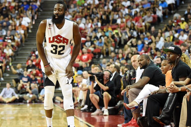 LAS VEGAS, NV - AUGUST 01:  Boxer Floyd Mayweather Jr. (R)  looks on as James Harden #32 of the 2014 USA Basketball Men's National Team reacts after Paul George #29 of the 2014 USA Basketball Men's National Team was injured while defending a layup by Harden during a USA Basketball showcase at the Thomas & Mack Center on August 1, 2014 in Las Vegas, Nevada. The rest of the exhibition was cancelled after the injury.  (Photo by Ethan Miller/Getty Images)