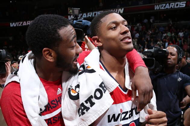 WASHINGTON, DC - APRIL 2: John Wall #2 and Bradley Beal #3 of the Washington Wizards celebrate clinching a playoff berth after the game against the Boston Celtics at the Verizon Center on April 2, 2014 in Washington, DC. NOTE TO USER: User expressly acknowledges and agrees that, by downloading and or using this photograph, User is consenting to the terms and conditions of the Getty Images License Agreement. Mandatory Copyright Notice: Copyright 2014 NBAE (Photo by Ned Dishman/NBAE via Getty Images)