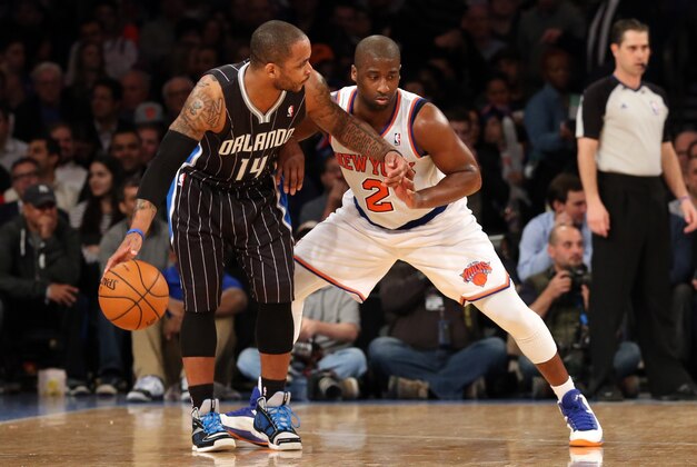 Mar 20, 2013; New York, NY, USA;  New York Knicks point guard Raymond Felton (2) guards Orlando Magic point guard Jameer Nelson (14) during the third quarter at Madison Square Garden.  Knicks won 106-94.  Mandatory Credit: Anthony Gruppuso-USA TODAY Sports