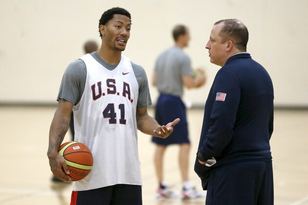 Derrick Rose, left, talks with assistant coach Tom Thibodeau during a practice of the men's U.S. National basketball team Thursday, Aug. 14, 2014, in Chicago. The U.S. team will face the Brazilian team in an exhibition game at the United Center in Chicago Saturday. (AP Photo/Charles Rex Arbogast)