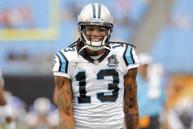 Carolina Panthers wide receiver Kelvin Benjamin (13) walks across the field prior to  a preseason NFL football game Friday, Aug. 8, 2014, in Charlotte, N.C. (AP Photo/Mike McCarn)