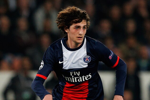 PARIS, FRANCE - MARCH 12:  Adrien Rabiot of PSG in action during the UEFA Champions League Round of 16 second leg match between Paris Saint-Germain FC and Bayer Leverkusen at Parc des Princes on March 12, 2014 in Paris, France.  (Photo by Dean Mouhtaropoulos/Getty Images)