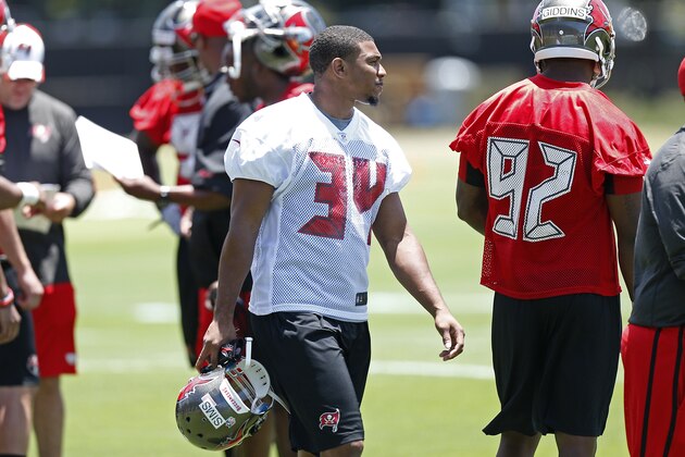 TAMPA, FL - MAY 16: Running Back Charles Sims #34 of the Tampa Bay Buccaneers works out during the first day of rookie minicamp on May 16, 2014 at One Buc Place in Tampa, Florida.  (Photo by Brian Blanco/Getty Images)