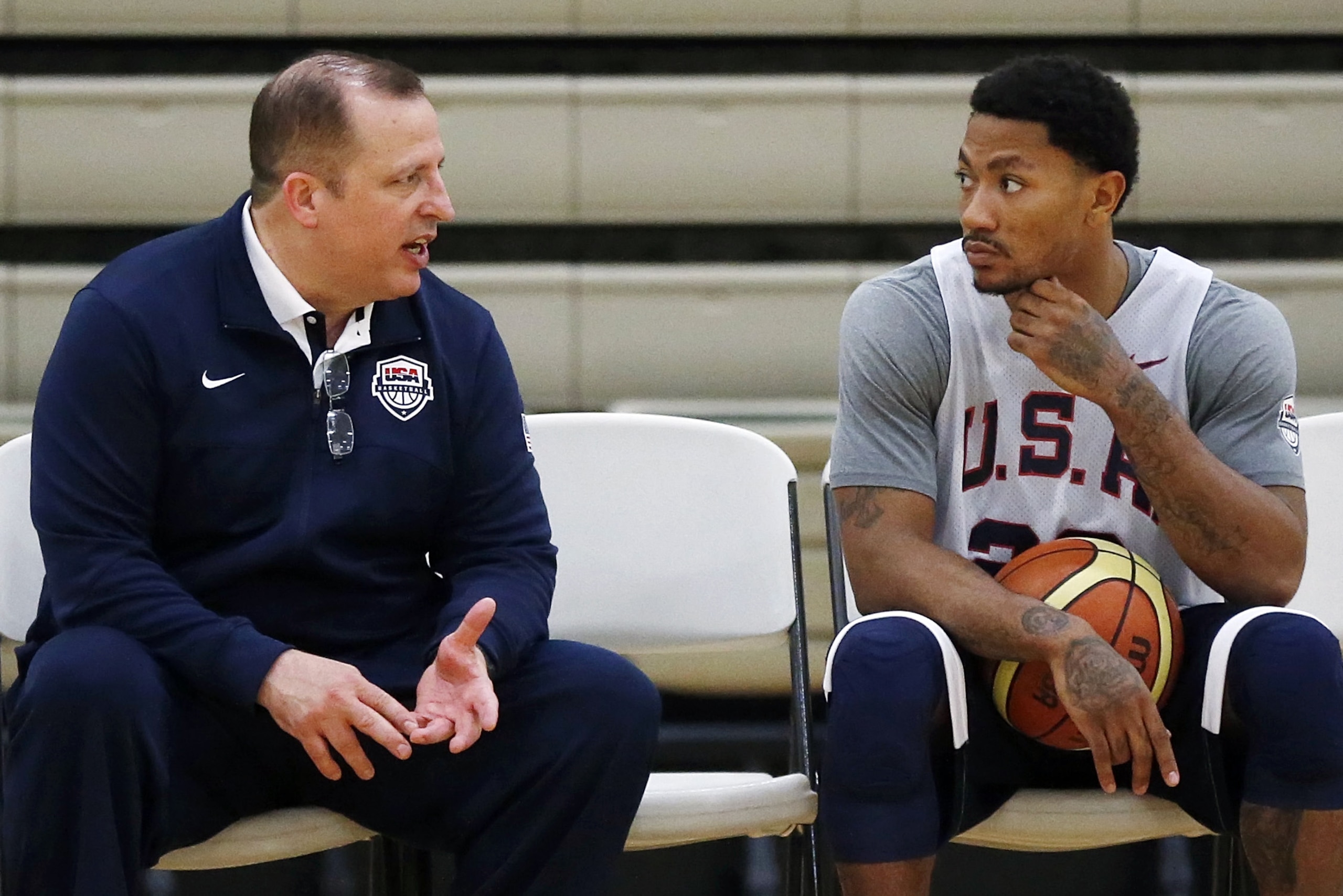 Assistant Coach Tom Thibodeau, left, and Derrick Rose speak during a practice of the men's U.S. National basketball team on Friday, Aug. 15, 2014, in Chicago. The U.S. team will face the Brazilian team in an exhibition game at the United Center in Chicago on Saturday. (AP Photo/Andrew A. Nelles)