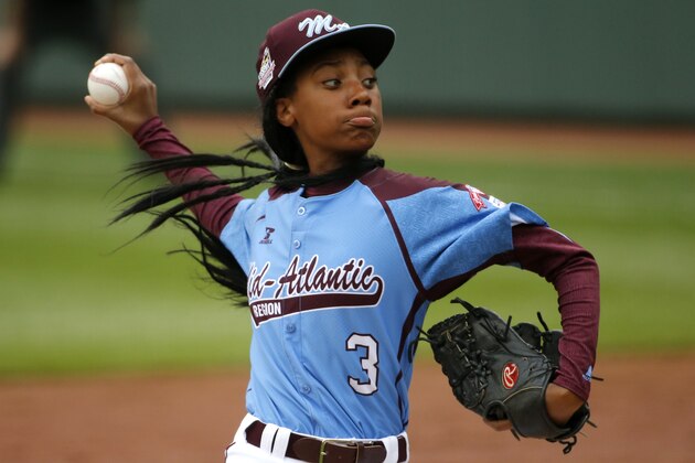 Pennsylvania's  Mo'ne Davis delivers in the fifth inning against Tennessee during a baseball game in United States pool play at the Little League World Series tournament in South Williamsport, Pa., Friday, Aug. 15, 2014. Pennsylvania won 4-0 with Davis pitching a complete game two-hit shutout. AP Photo/Gene J. Puskar)