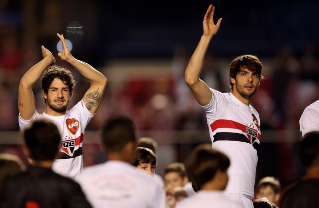 SAO PAULO, BRAZIL - AUGUST 10:  Pato and Kaka of Sao Paulo walks in before the match between Sao Paulo and Vitoria for the Brazilian Series A 2014 at Estadio do Morumbi on August 10, 2014 in Sao Paulo, Brazil.  (Photo by Friedemann Vogel/Getty Images)