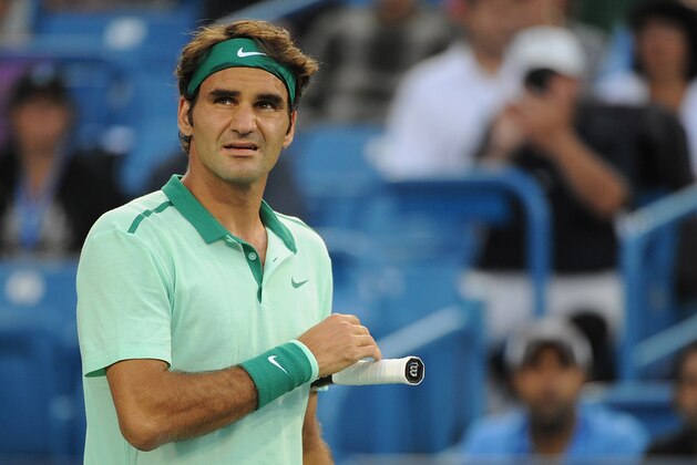 CINCINNATI, OH - AUGUST 15:  Roger Federer of Switzerland reacts during a match against Andy Murray of Great Britian on day 7 of the Western & Southern Open at the Linder Family Center on August 15, 2014 in Cincinnati, Ohio.  (Photo by Jonathan Moore/Getty Images)