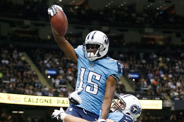 NEW ORLEANS, LA - AUGUST 15:  Justin Hunter #15 of the Tennessee Titans celebrates after scoring during a preseason game against the New Orleans Saints at Mercedes-Benz Superdome on August 15, 2014 in New Orleans, Louisiana.  (Photo by Stacy Revere/Getty Images)
