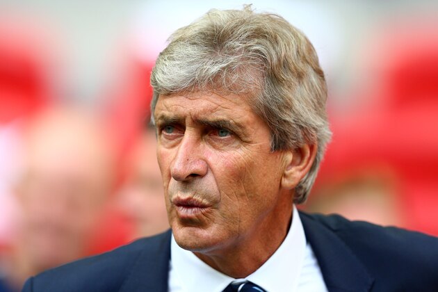 LONDON, ENGLAND - AUGUST 10: Manuel Pellegrini, manager of Manchester City looks on during the FA Community Shield match between Manchester City and Arsenal at Wembley Stadium on August 10, 2014 in London, England.  (Photo by Clive Mason/Getty Images)