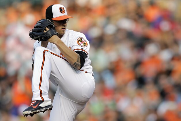 Baltimore Orioles starting pitcher Kevin Gausman throws to the Los Angeles Angels in the first inning of a baseball game, Wednesday, July 30, 2014, in Baltimore. (AP Photo/Patrick Semansky)