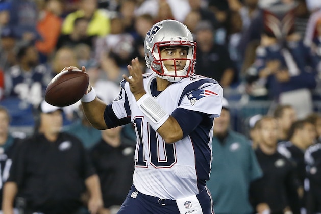 New England Patriots quarterback Jimmy Garoppolo looks for a pass receiver against the Philadelphia Eagles in the first half of an NFL preseason football game Friday, Aug. 15, 2014, in Foxborough, Mass. (AP Photo/Elise Amendola)