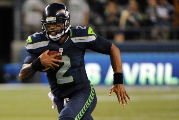 SEATTLE, WA - AUGUST 15: Quarterback Terrelle Pryor #2 of the Seattle Seahawks runs for a touchdown during the fourth quarter of the game against the San Diego Chargers at CenturyLink Field on August 15, 2014 in Seattle,Wa. (Photo by Steve Dykes/Getty Images)