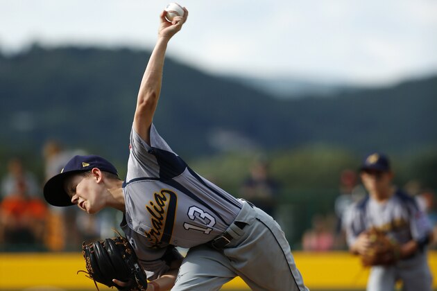 Australia’s Nicholas Riley pitches during the first inning of an international pool play baseball game against Puerto Rico at the Little League World Series, Thursday, Aug. 14, 2014, in South Williamsport, Pa. Puerto Rico won 16-3. (AP Photo/Matt Slocum)
