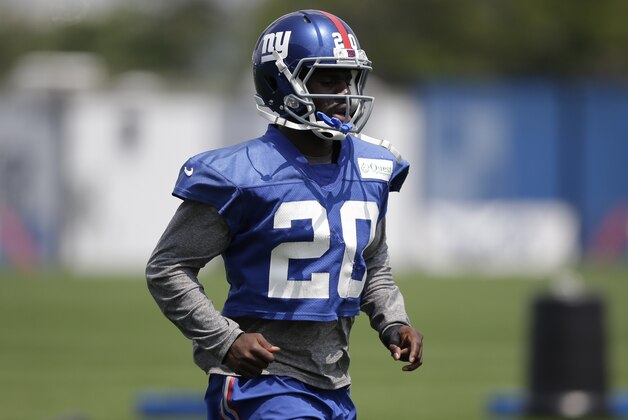 New York Giants' Prince Amukamara during a NFL football camp in East Rutherford, N.J., Tuesday, July 22, 2014. (AP Photo/Seth Wenig)