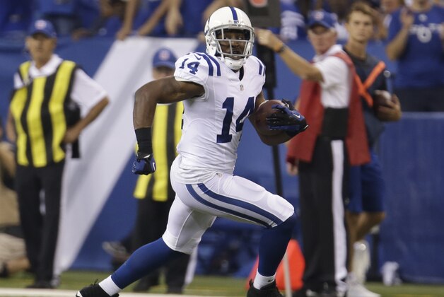 Indianapolis Colts' Hakeem Nicks (14) runs following a catch during the first half of an NFL preseason football game against the New York Giants Saturday, Aug. 16, 2014, in Indianapolis. (AP Photo/AJ Mast)