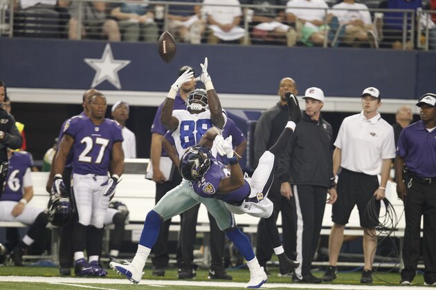 Dallas Cowboys wide receiver Dez Bryant (88) makes a catch against Baltimore Ravens cornerback Jimmy Smith (22) during the first half of an NFL preseason football game Saturday, Aug. 16, 2014, in Arlington, Texas. (AP Photo/Matt Strasen)